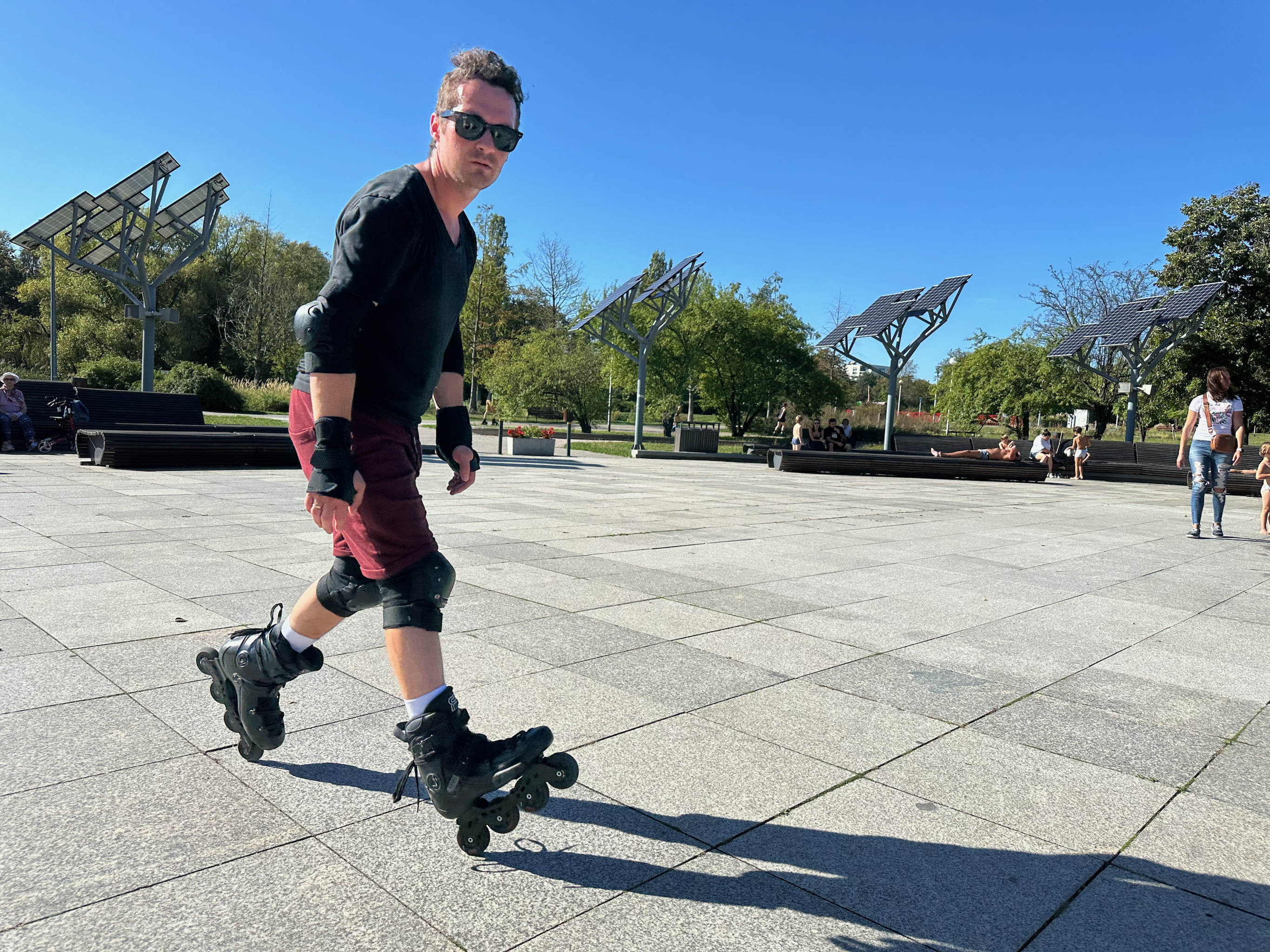 A man doing heel-toe on roller-skates